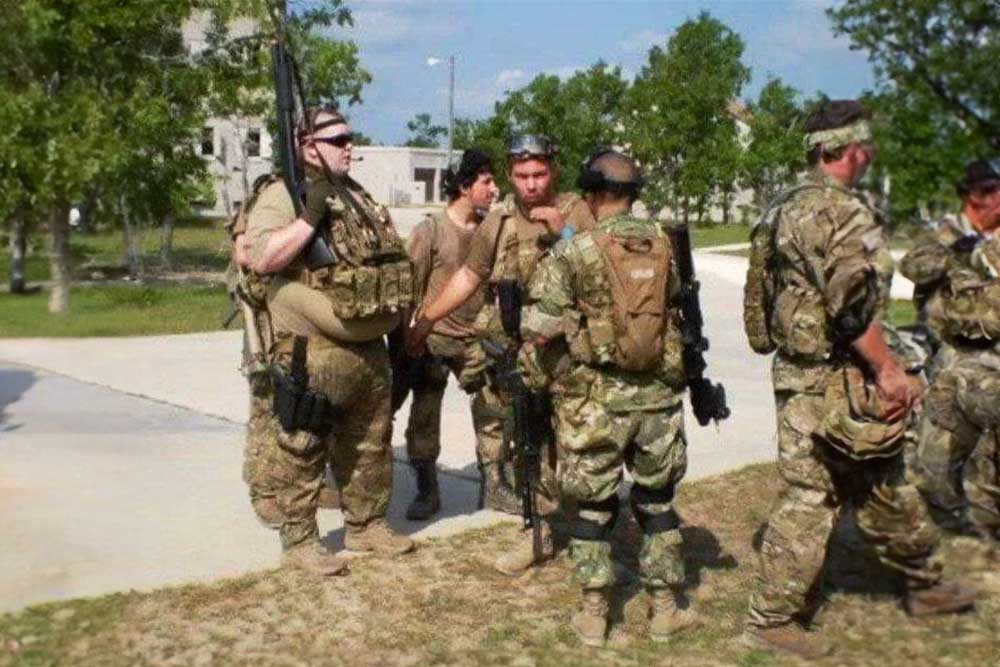 Fat man with gun pretending to be tactical